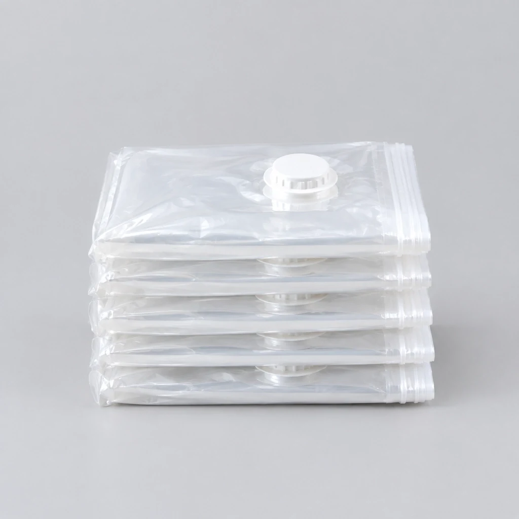 Stack of transparent vacuum compression storage bags